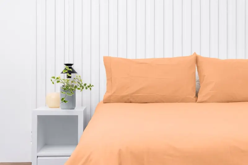 Par de fundas de almohadas 150 hilos color melón 100% algodón