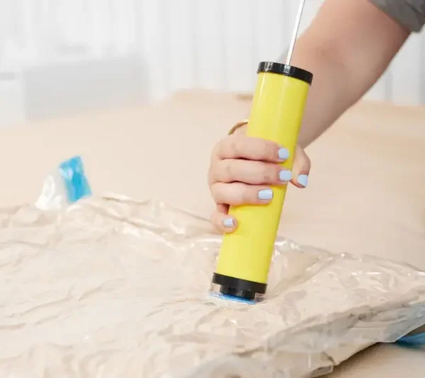 Succionador de aire para ropa de cama