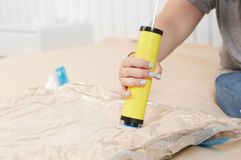 Succionador de aire para ropa de cama
